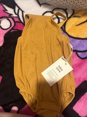 Kyte BABY Mustard One-Piece Romper